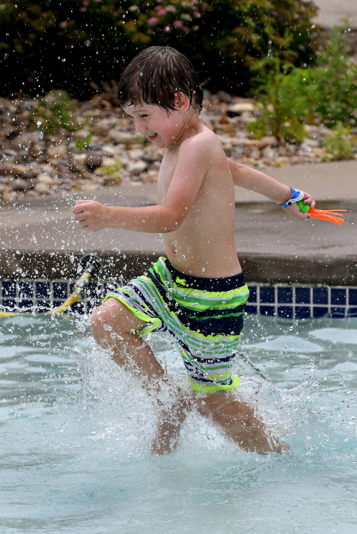 People cooling off on a hot day at Splash Landing in Bettendorf.